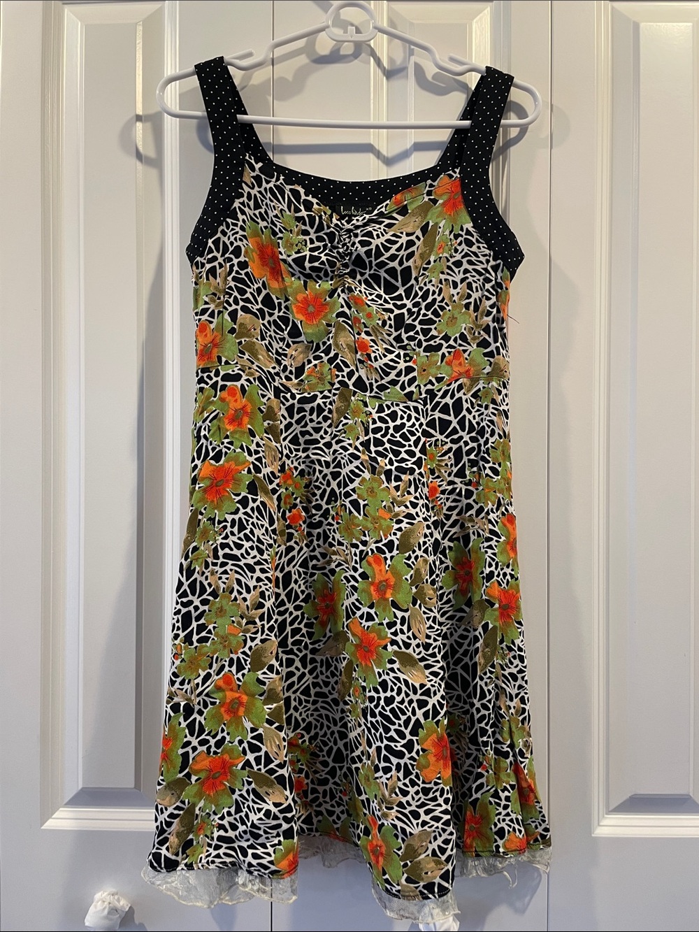 Black & White Floral Mini Dress with Orange Accents